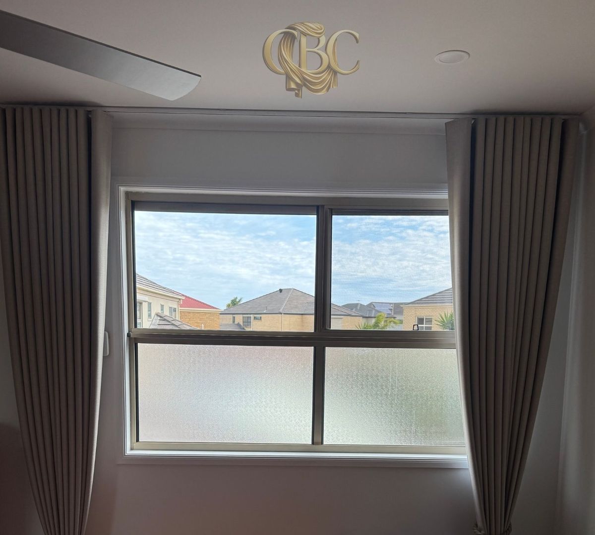 Blockout drapes on a wide bedroom window