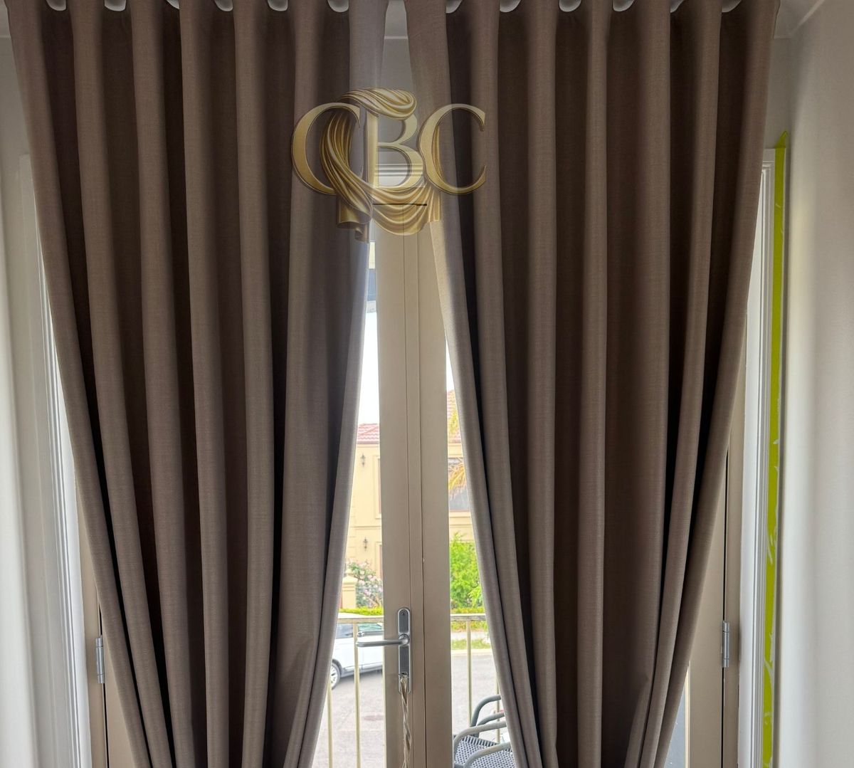 Blockout curtains framing balcony doors