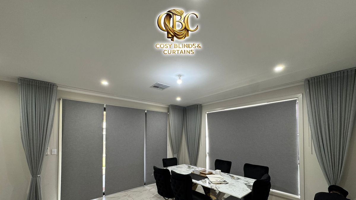 Blockout roller blinds with curtains in a dining room