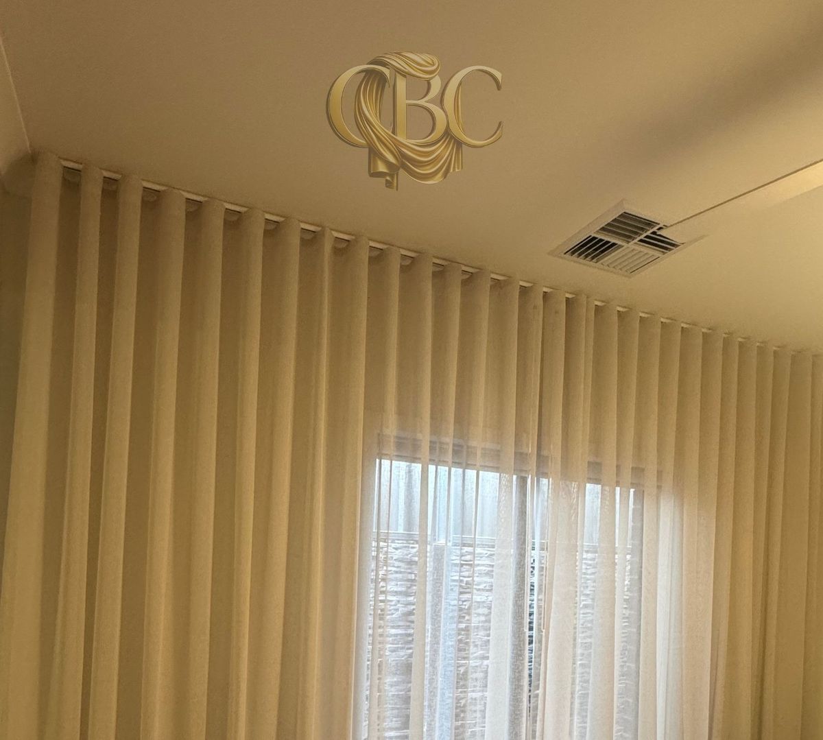 S-Wave sheers curving around a bedroom corner